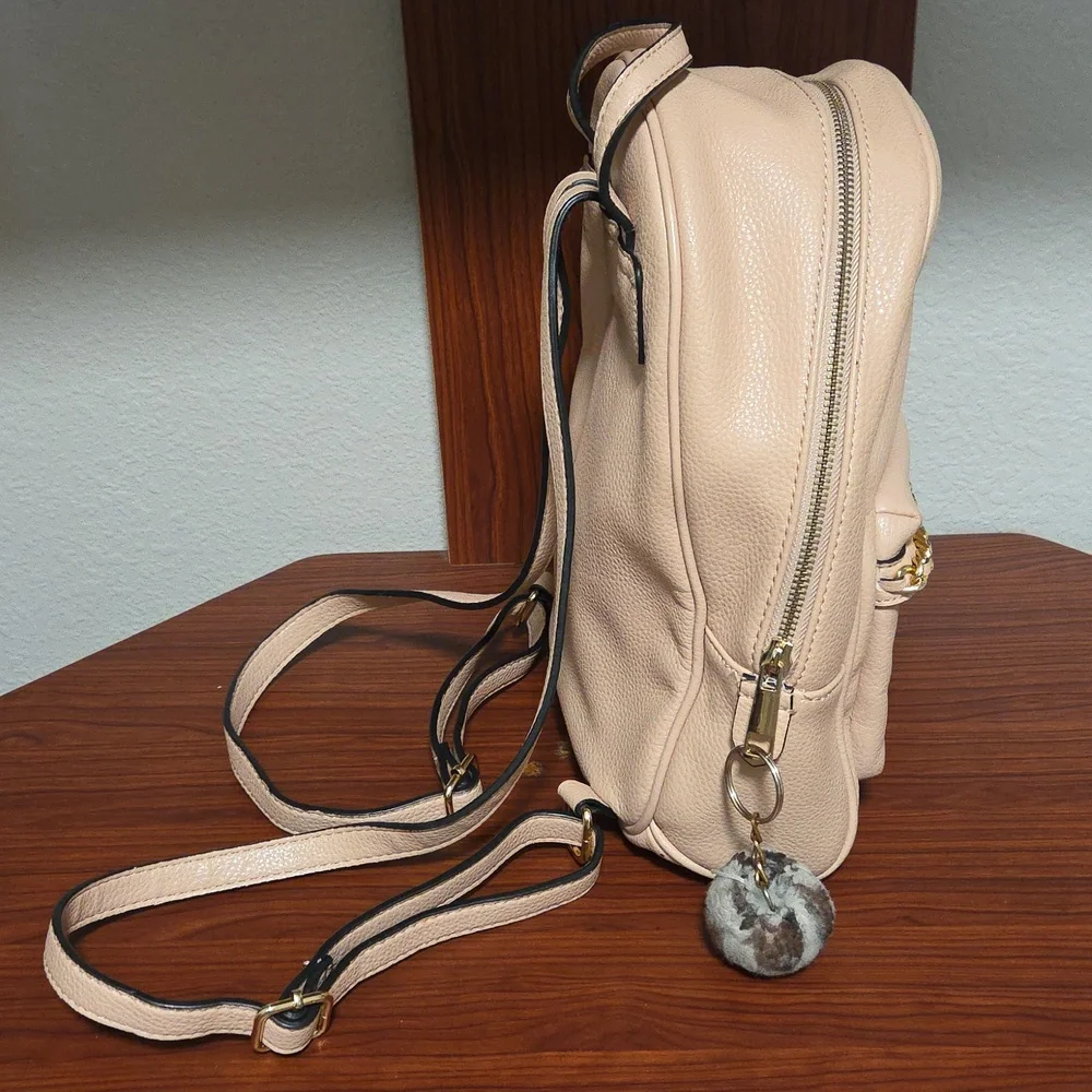 Elegant Light Pink Backpack with Gold Accents